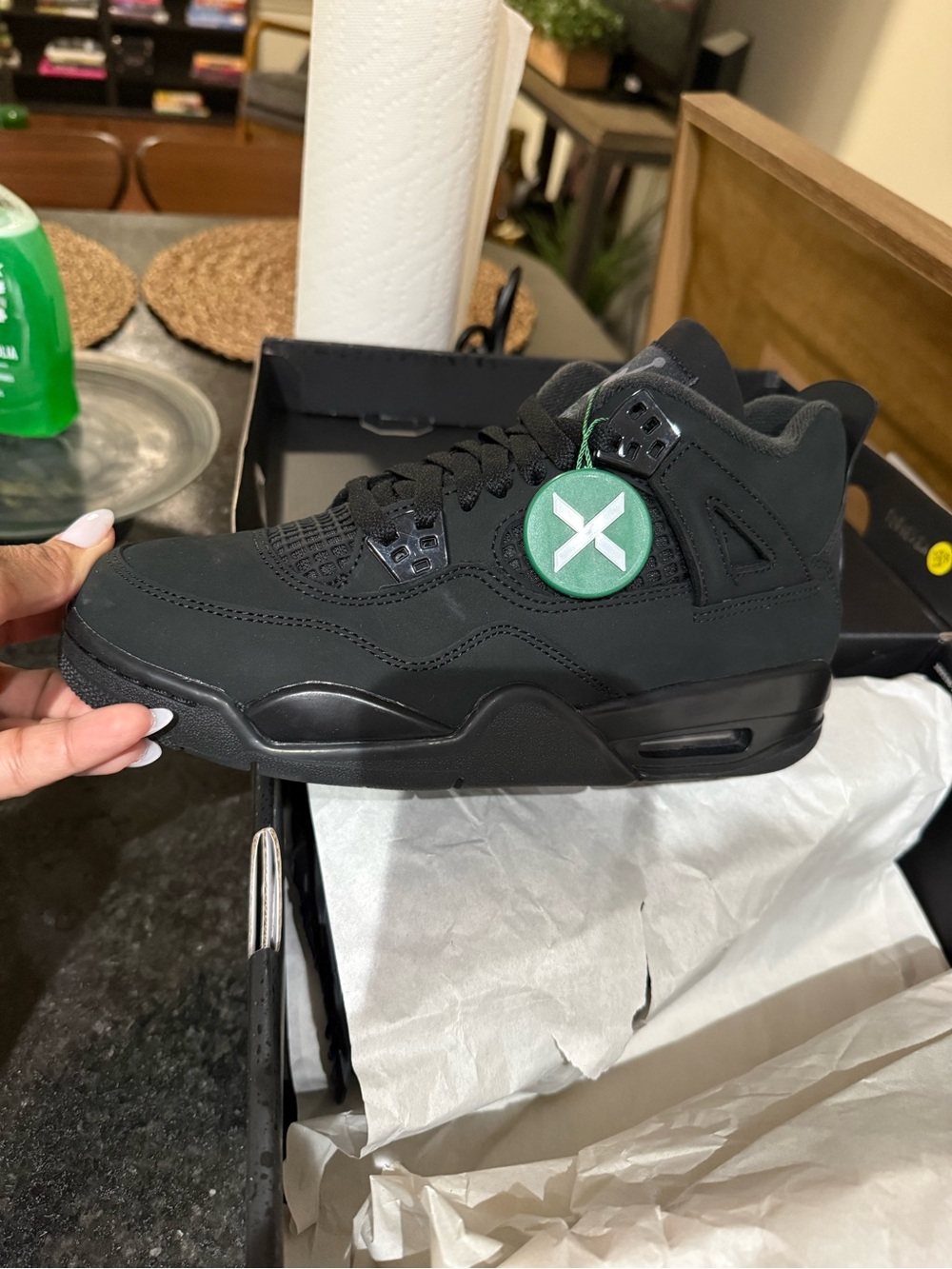 Jordan Black High-Top Sneakers with Green Tag